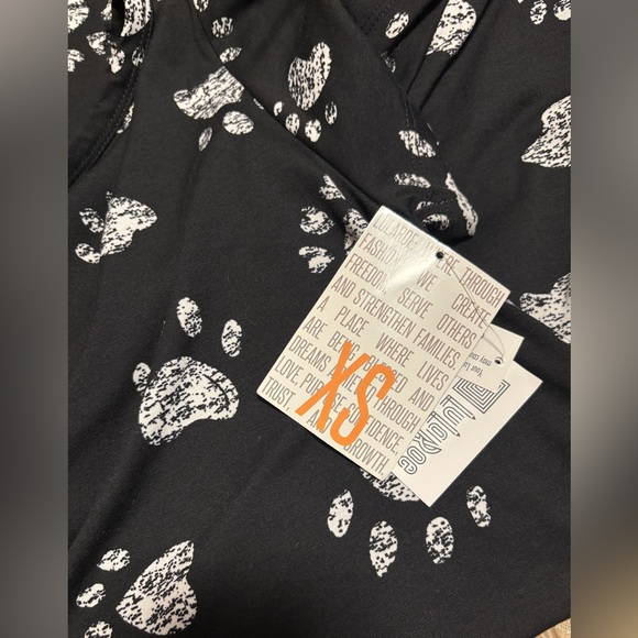 LuLaRoe Carl Swing Black Dress with White Paw Prints Size Small - Picture 2 of 3